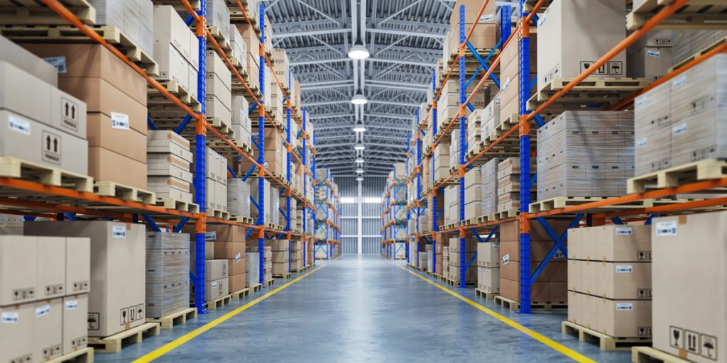 Warehouse or storage and shelves with cardboard boxes. Industrial background.